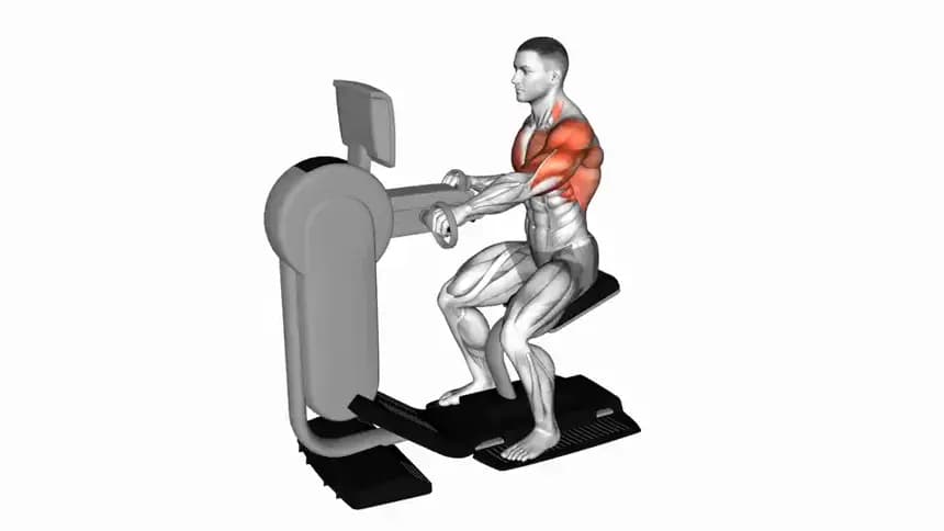یک فرد در حال انجام تمرین دوچرخه دستی روی دستگاه در باشگاه