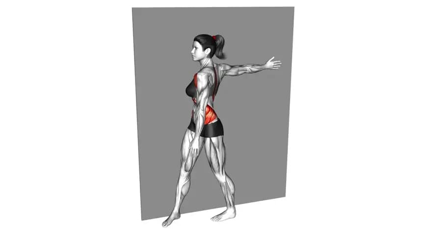 یک زن در حال انجام حرکت کشش چرخش پشت به صورت ایستاده