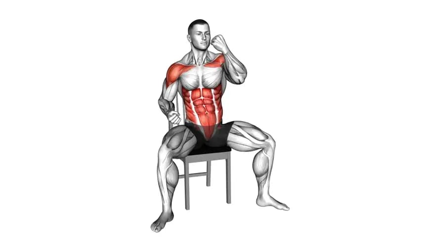 مردی در حال انجام حرکت آپرکات نشسته روی یک صندلی ثابت