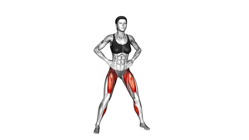 یک زن در حال انجام حرکت کیک باسن ایستاده با فرم صحیح